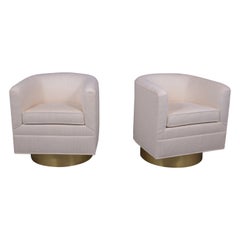 Pair of Mid-Century Modern Upholstered Swivel Chairs