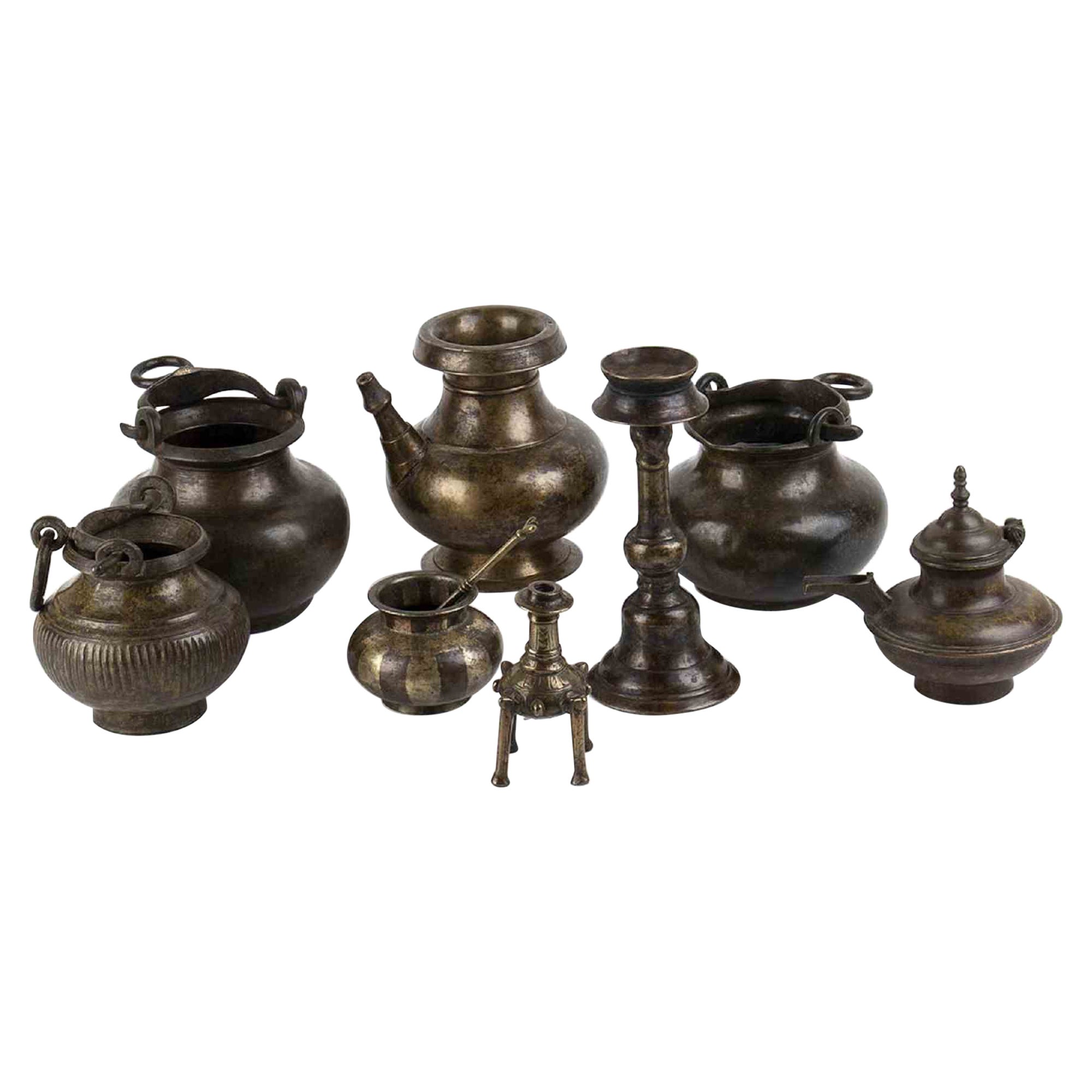 Set of Eight Copper Alloy Containers, One with a Spoon, India, 19th-20th Century