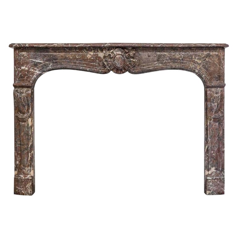 19th Century, Louis XV Style Antique Fireplace Mantel in Rouge Royal Marble For Sale