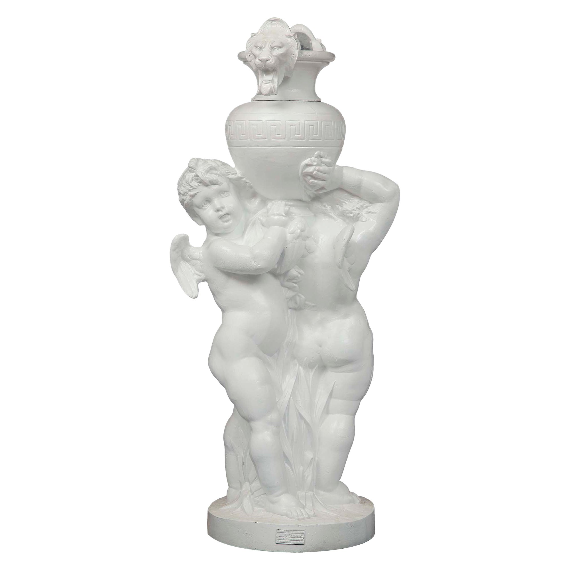 French Louis XVI St. 19th Century Cast Iron Grouping of Two Winged Cherubs For Sale