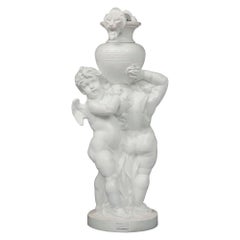 French Louis XVI St. 19th Century Cast Iron Grouping of Two Winged Cherubs
