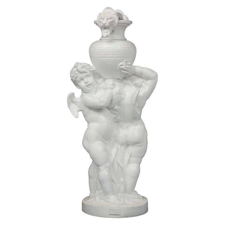 French Louis XVI St. 19th Century Cast Iron Grouping of Two Winged Cherubs  For Sale at 1stDibs