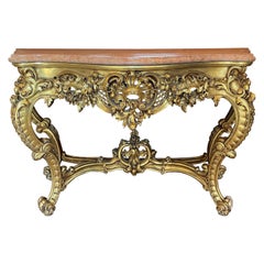 A French Rococo Giltwood and Marble Console Table