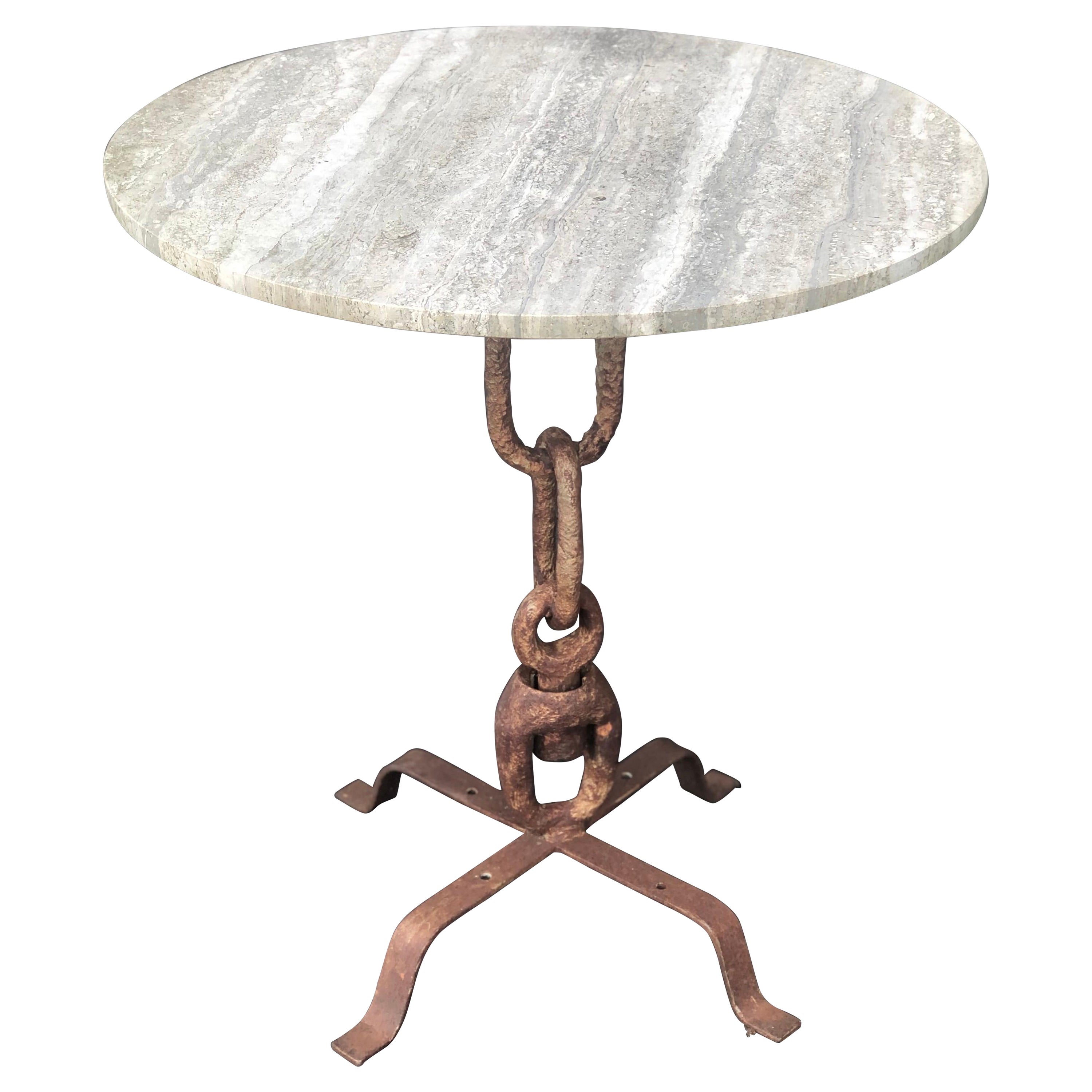 Table de salle à manger ou de jardin en fer forgé et travertin dans le style de Giacometti 