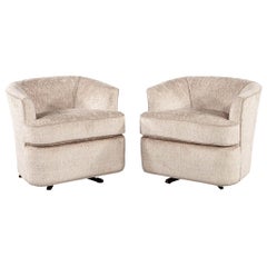 Pair of Mid-Century Modern Upholstered Swivel Chairs