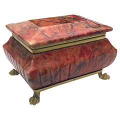 Well-Figured Lidded Sarcophagus-Shaped Coral Colored Marble Box