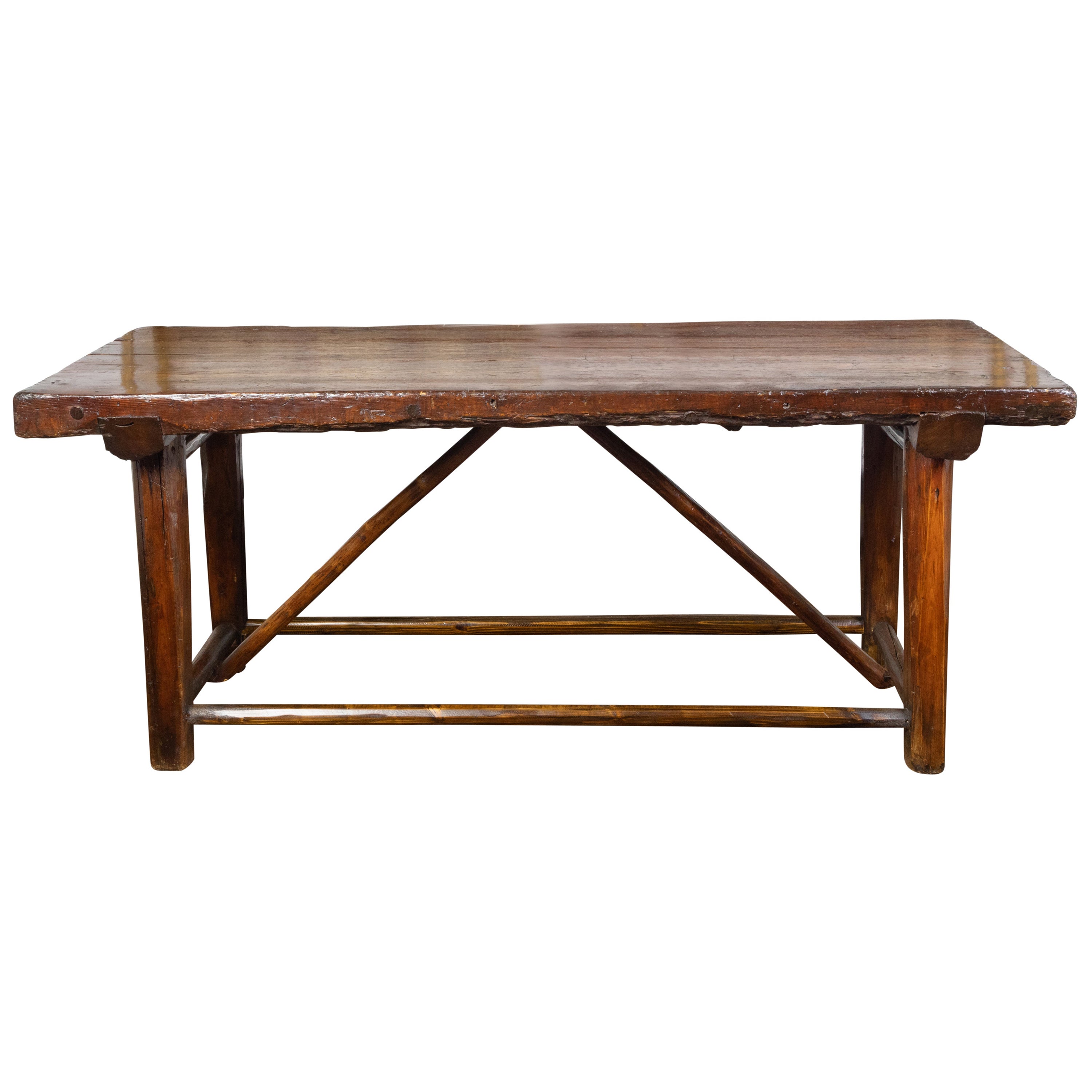 American 1900s Rustic Pine Log Table with Straight Legs and Side Stretchers For Sale