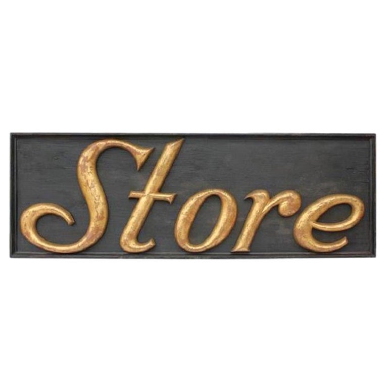 Early 20th Century "Store" Gilded Cast Iron Sign For Sale