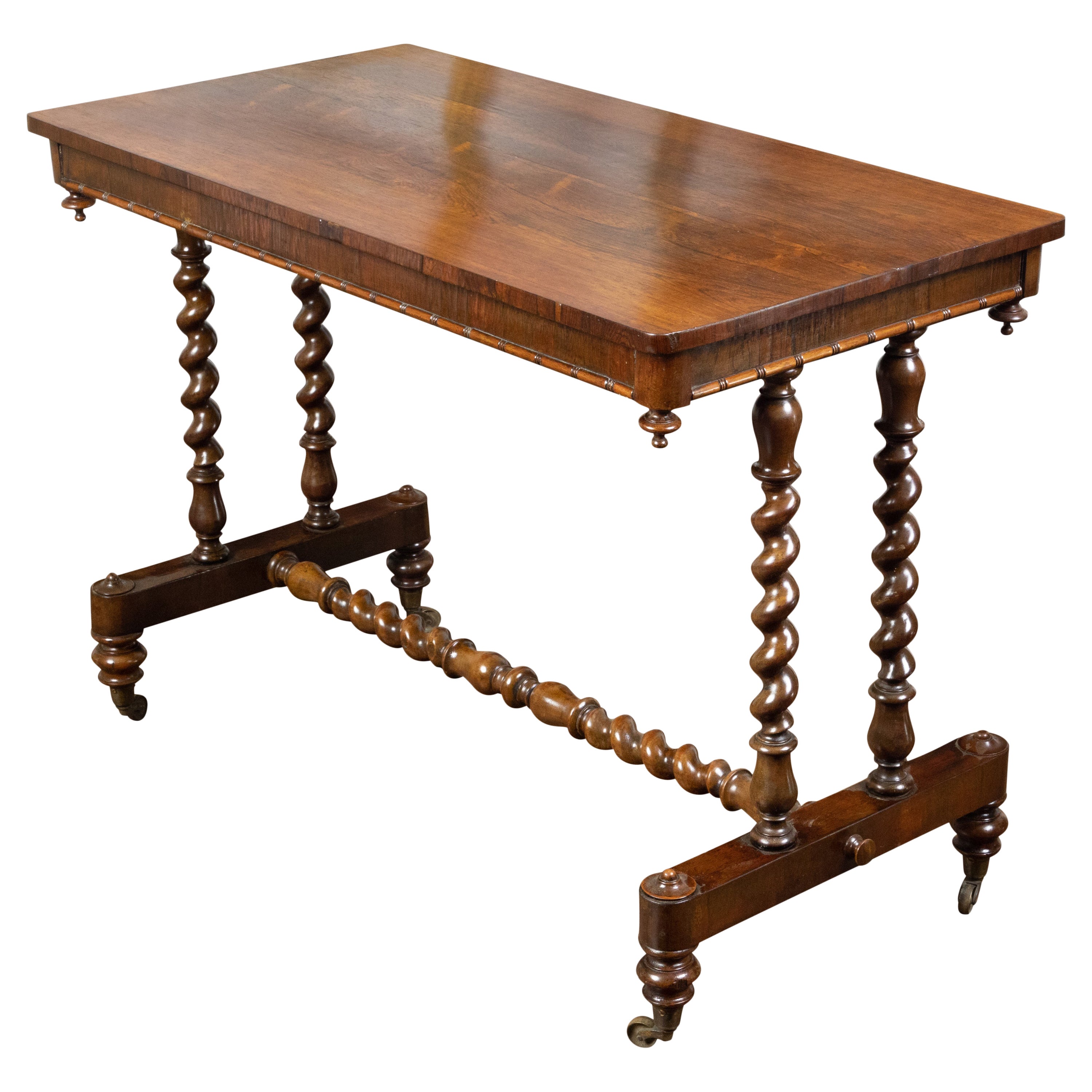 English 1860s Mahogany Table with Barley Twist Base and Petite Casters For Sale