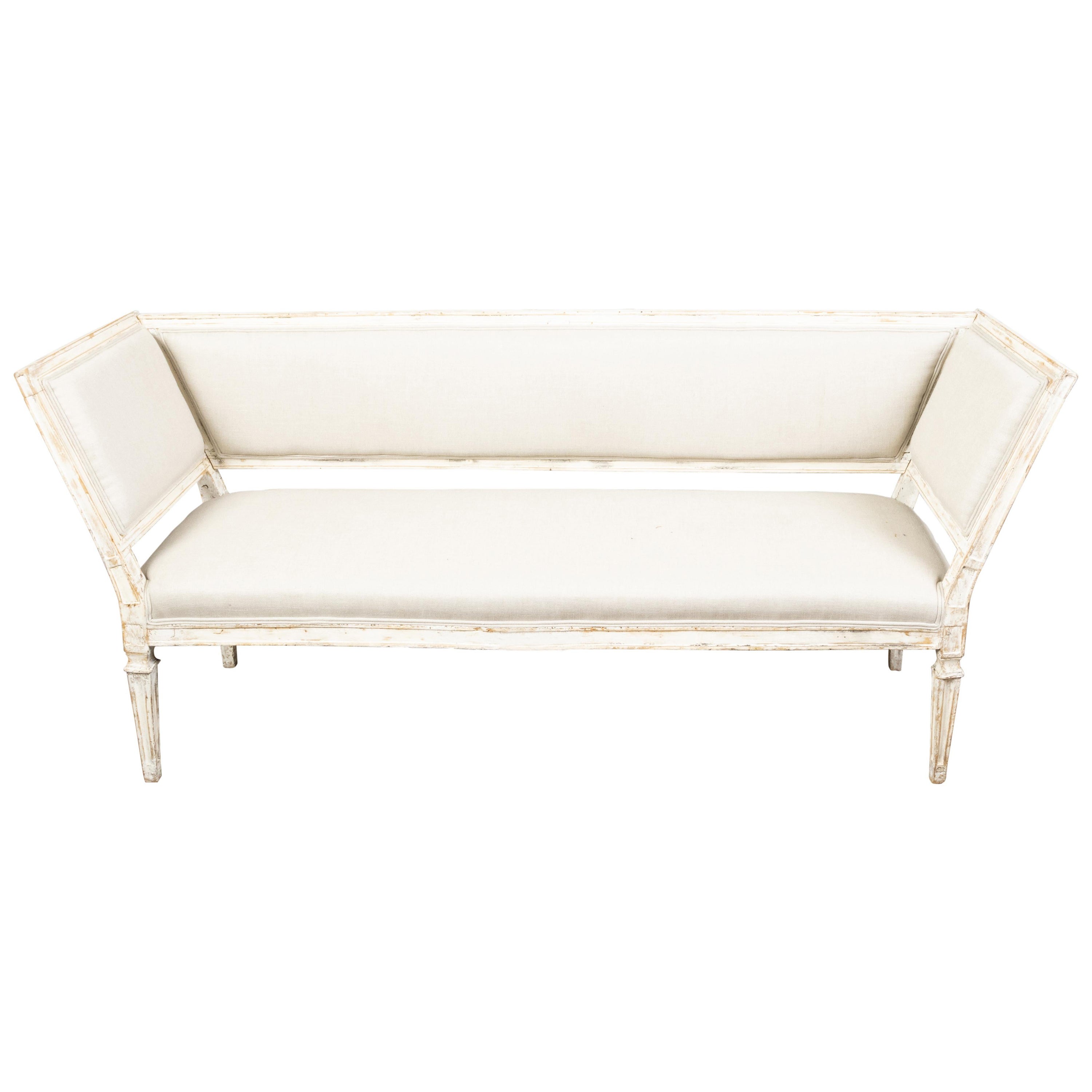 Italian 19th Century White Painted Sofa with Slanted Sides and Distressed Patina For Sale