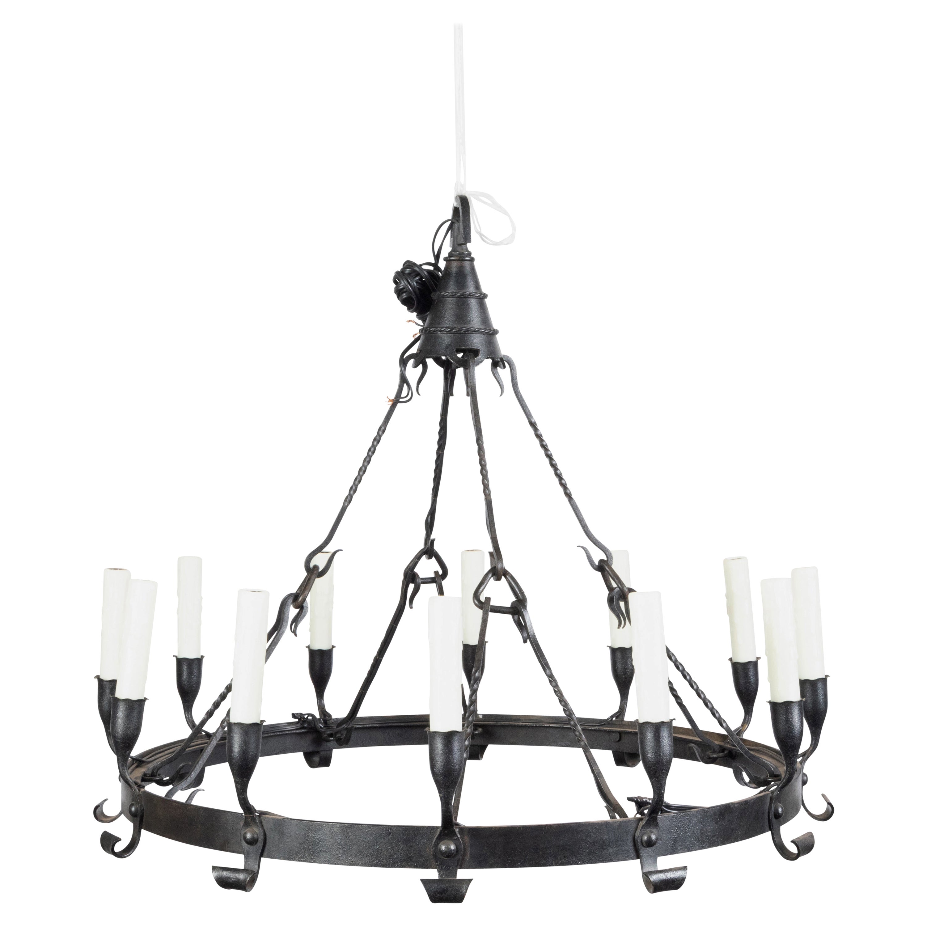 Spanish Colonial 1900s 12-Light Iron Chandelier with Ring and Dark Patina For Sale