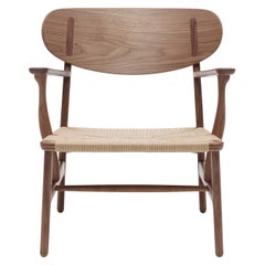 CH22 Lounge Chair in Walnut Oil with Natural Papercord Seat by Hans J. Wegner