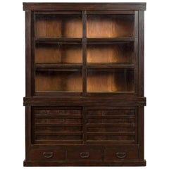 Japanese Early 20th Century Wooden Bookcase with Glass Sliding Doors and Drawers