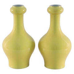 Pair of Chinese Yellow Garlic-Mouthed Porcelain Vases