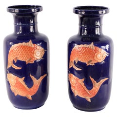 Vintage Pair of Chinese Blue and Orange Fish Design Porcelain Sleeve Vases