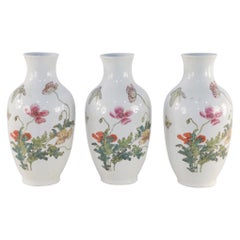 Chinese White Floral and Butterfly Patterned Porcelain Vases