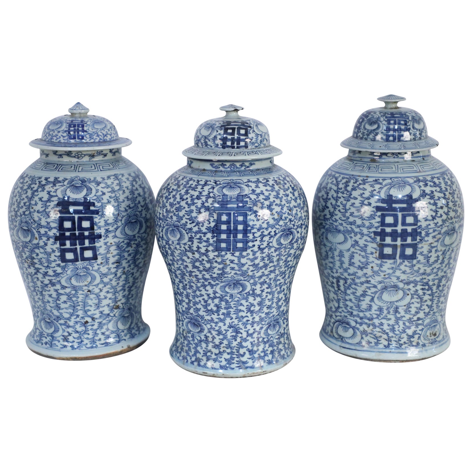 Chinese White and Blue Floral Lidded Urns