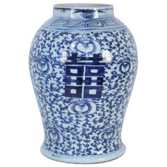 Antique Chinese White and Blue Character and Floral Urn