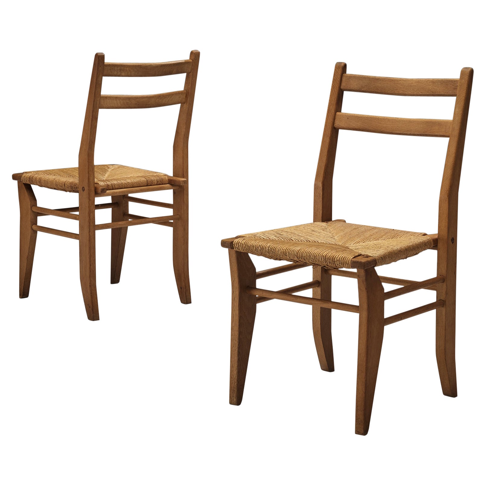 Guillerme & Chambron Pair of Dining Chairs in Oak and Cane