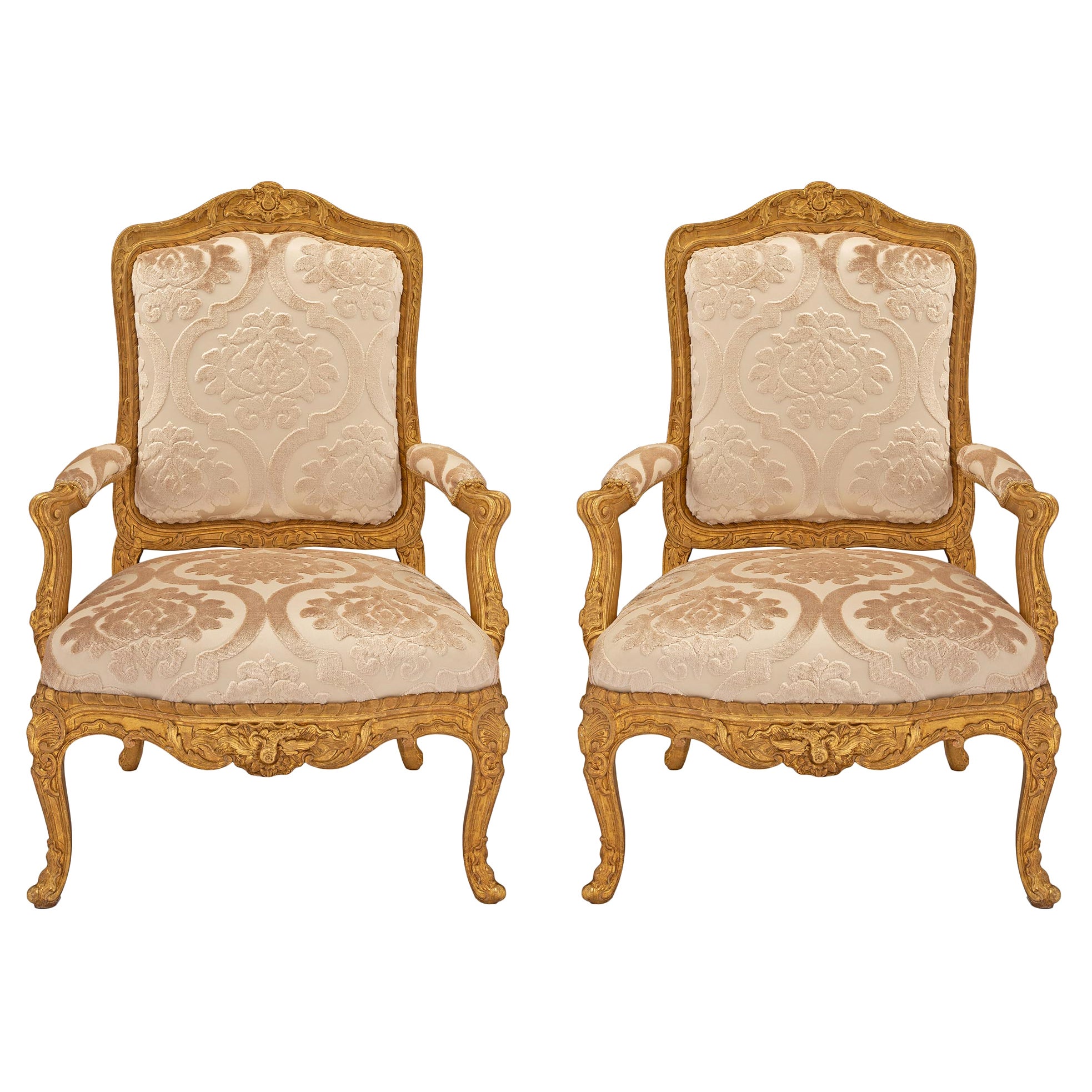 Pair of French Early 19th Century Louis XV St. Giltwood Armchairs For Sale