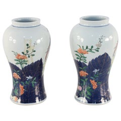 Pair of Chinese White Peacock and Floral Design Urn-Shaped Porcelain Vases
