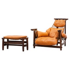 1960s wood, leather cushion Lounge Chair and Ottoman by Jean Gillon