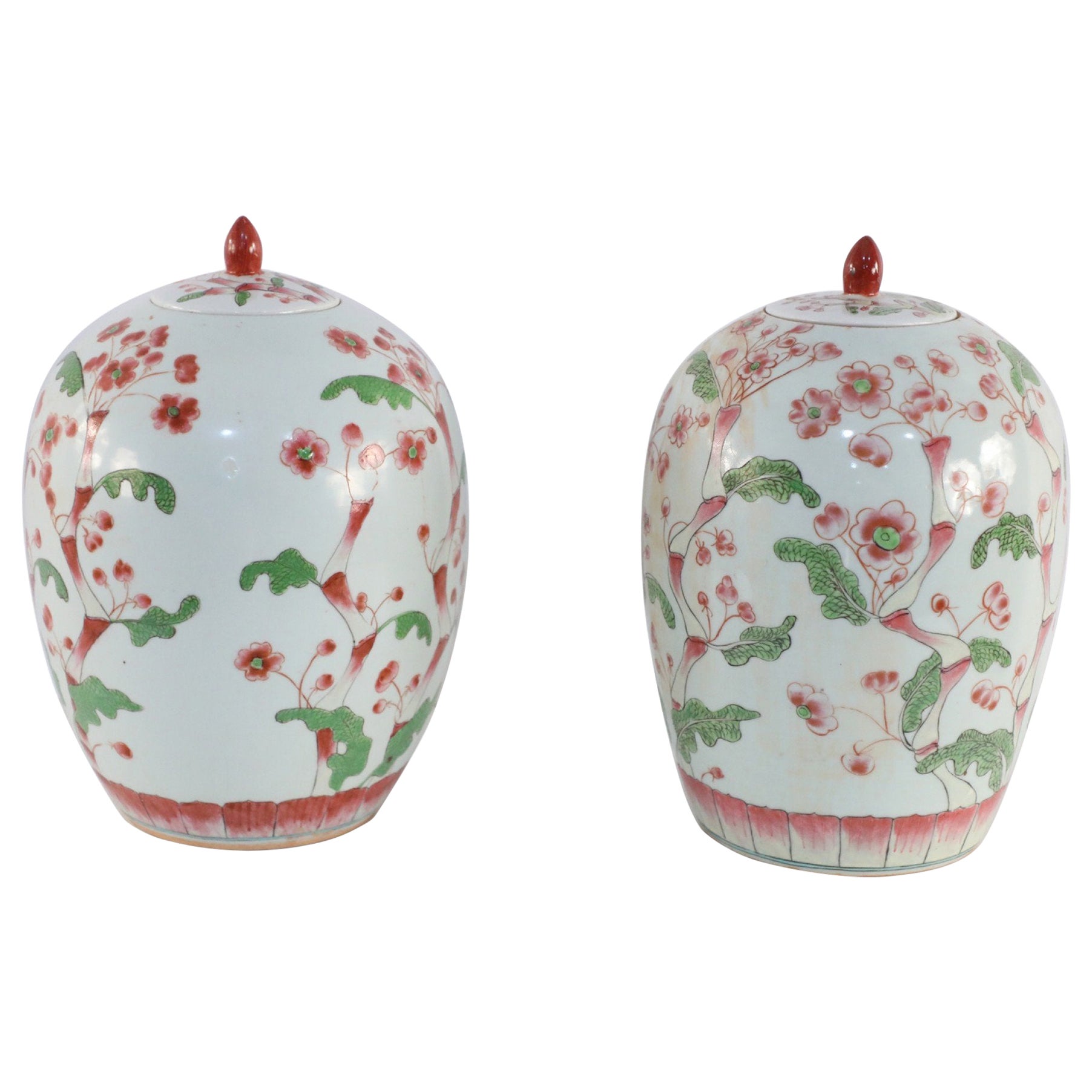 Pair of Chinese White and Pink Cherry Blossom Motif Lidded Porcelain Urns For Sale