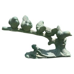 Bronze Sculpture of Five Small Birds over a Tree Branch