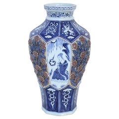 Chinese White and Blue Raised Rose Design Octagonal Porcelain Vase