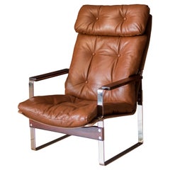 Mid-Century Modern Leather and Rosewood Lounge Chair by Richard Young