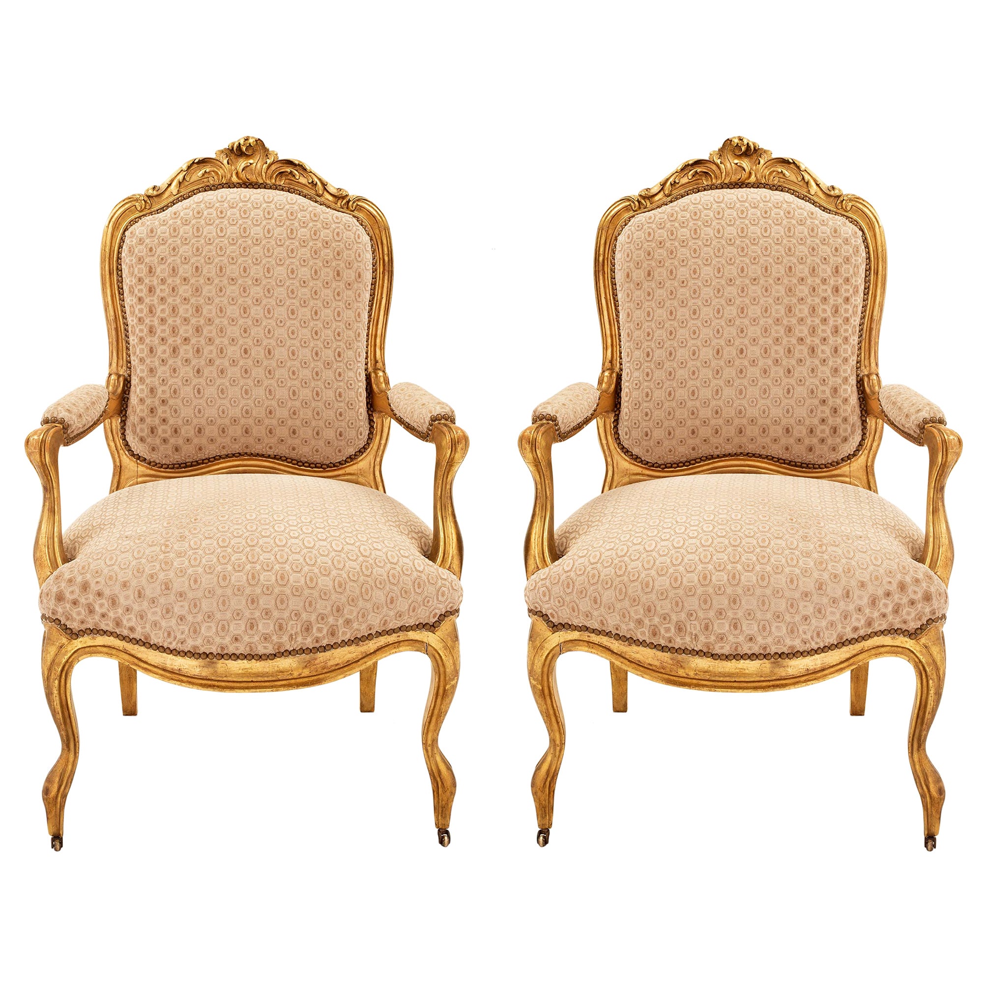 Pair of French 19th Century Louis XV Style Giltwood Armchairs