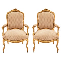 Pair of French 19th Century Louis XV Style Giltwood Armchairs