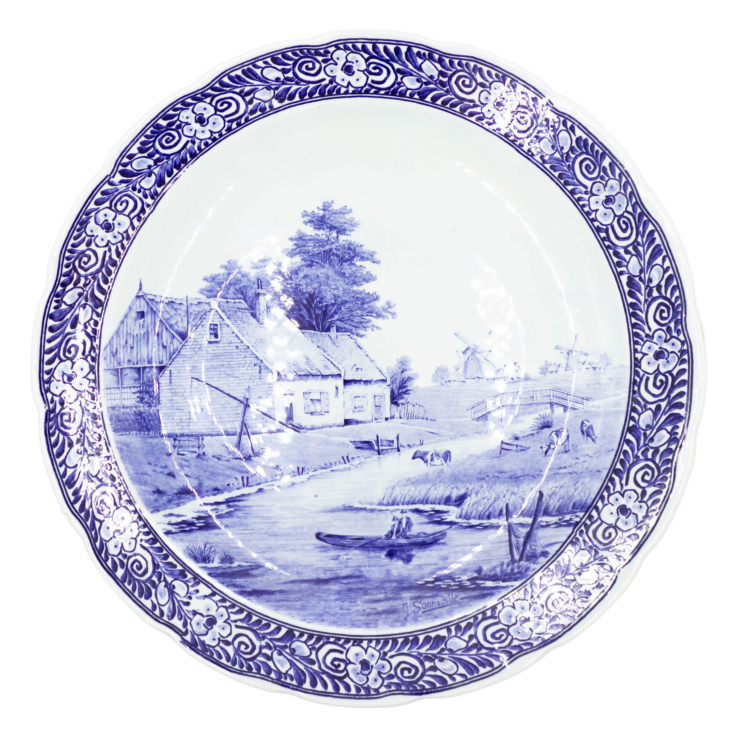 19th Century Pair of Dutch Porcelain Landscape Charger Plates For Sale