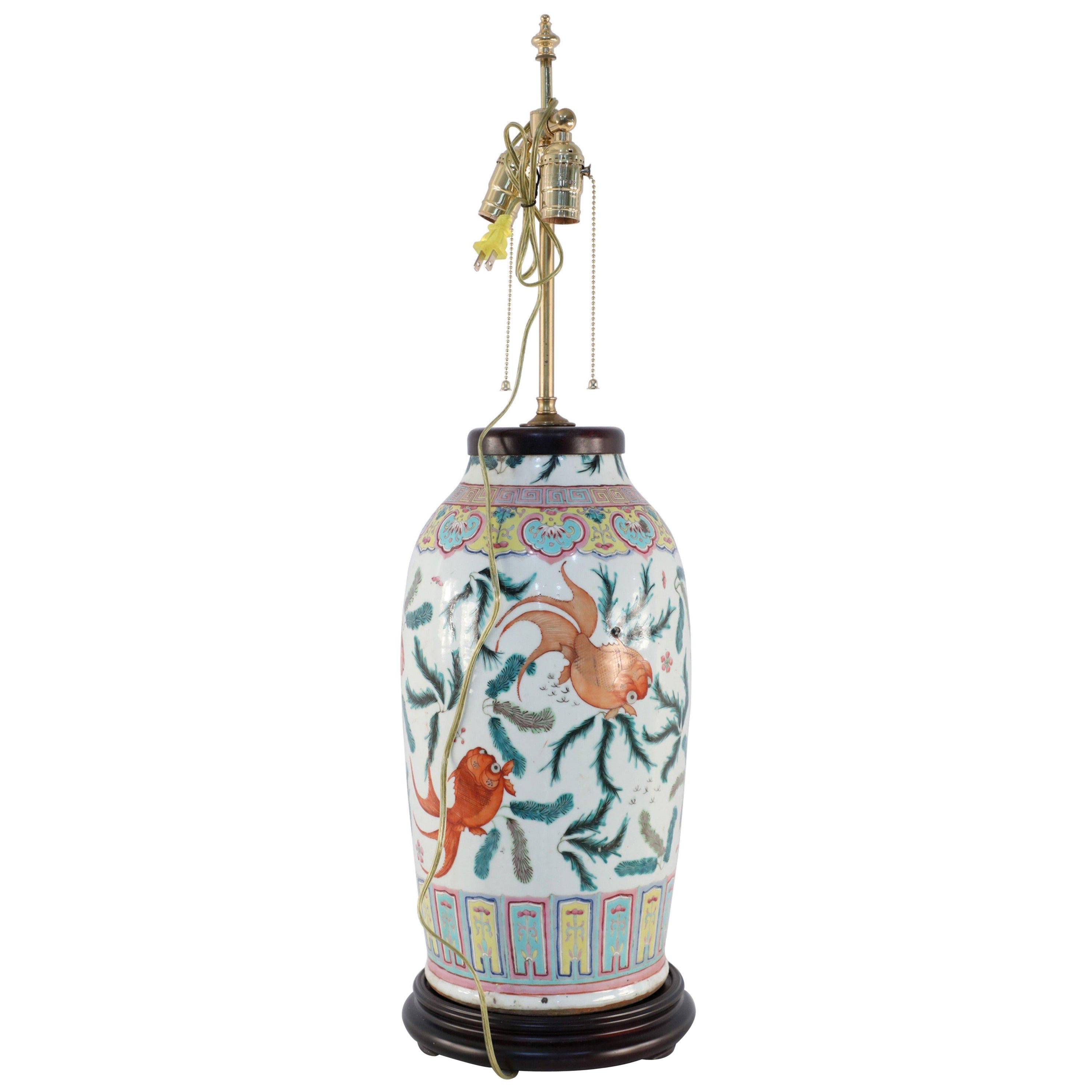Chinese Ceramic Cream, Orange, and Green Fish Motif Porcelain Table Lamp For Sale