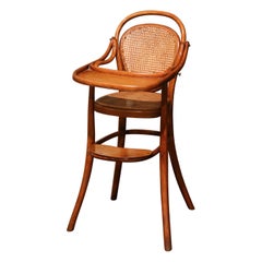 Sedia alta per bambini francese in legno di bengala e canna dei primi del Novecento, stile Thonet