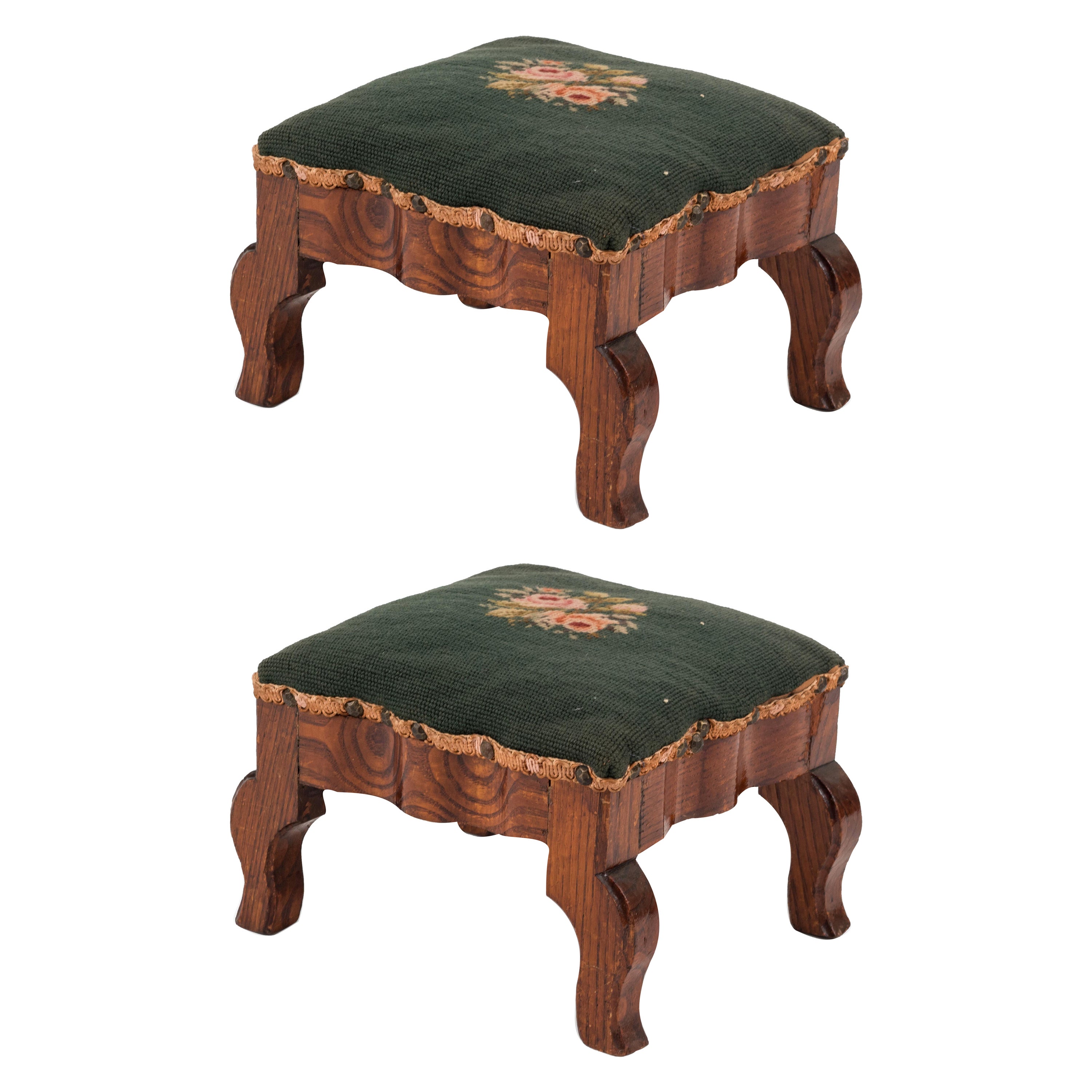 Pair of French Victorian rectangular foot stools with needlepoint upholstery.
 