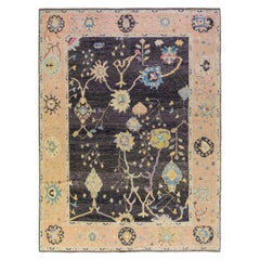 Tapis moderne turc Oushak fait à la main en laine noire à motifs floraux multicolores