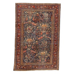   Ancien tapis persan traditionnel tissé à la main de luxe en laine bleu marine et rose