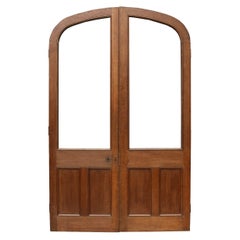 Two Reclaimed Arched Oak Doors