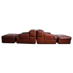 Pair of Brazilian Leather Lounge Chairs and Ottomans by Pervical Lafer
