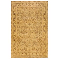 Tapis persan moderne Tabriz en laine dorée à motifs floraux faits à la main