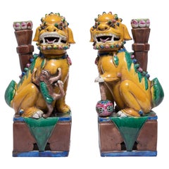 Pair of Chinese Yellow Glazed Ceramic Fu Dogs, c. 1900