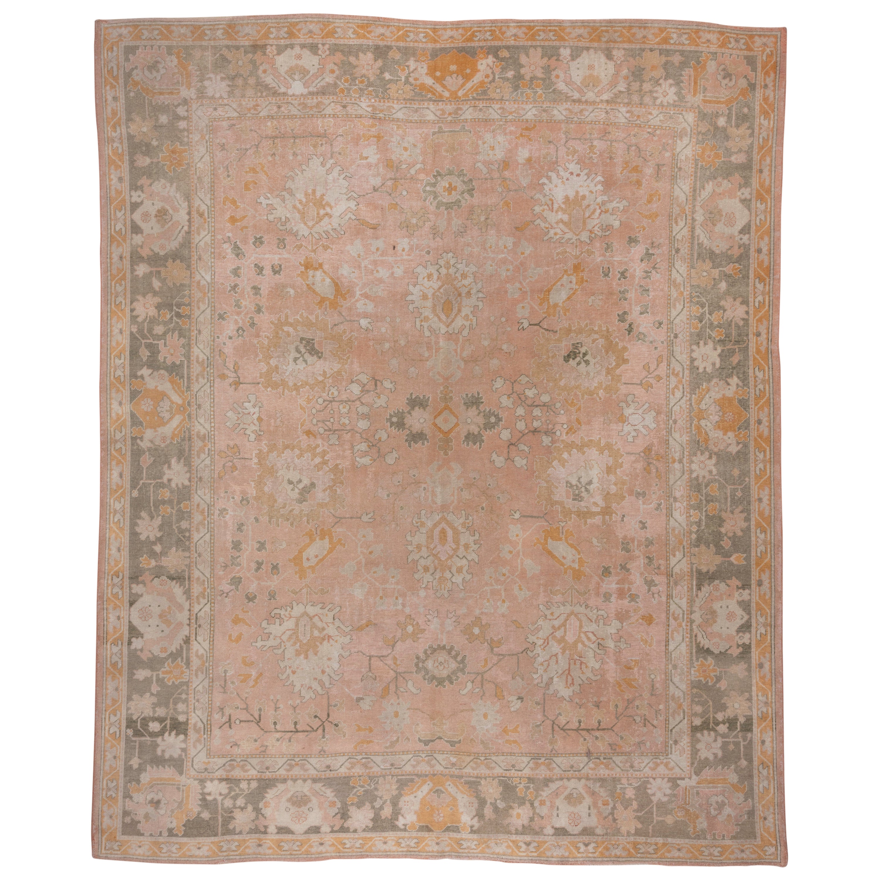 Magnifique tapis turc ancien d'Oushak des années 1910, champ rose, accents verts et orange