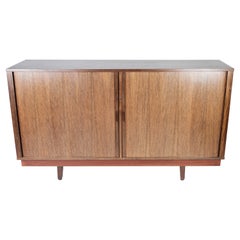 Low Sideboard with Sliding Doors in Rosewood of Danish Design from the 1960s