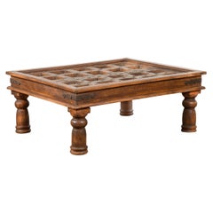 Antique 19th Century Indian Paneled Door with Iron Accents Turned into a Coffee Table