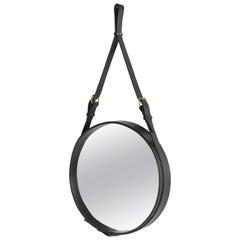 Petit miroir circulaire en cuir noir Jacques Adnet