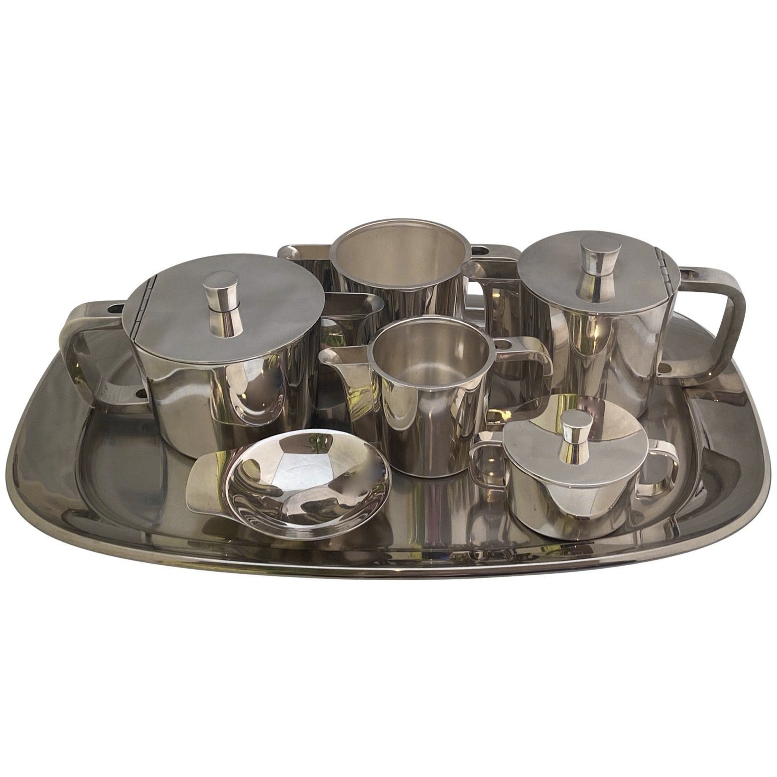 An extensive midcentury alpacca silver plated Gio Ponti coffee and tea set on a tray, Arthur Krupp. Designed for the VI Triennale. An oval tray, 75CL tea pot, coffee pot, sugar bowl, 2 cold milk or water jugs as well as a tiny Arthur Krupp dish...