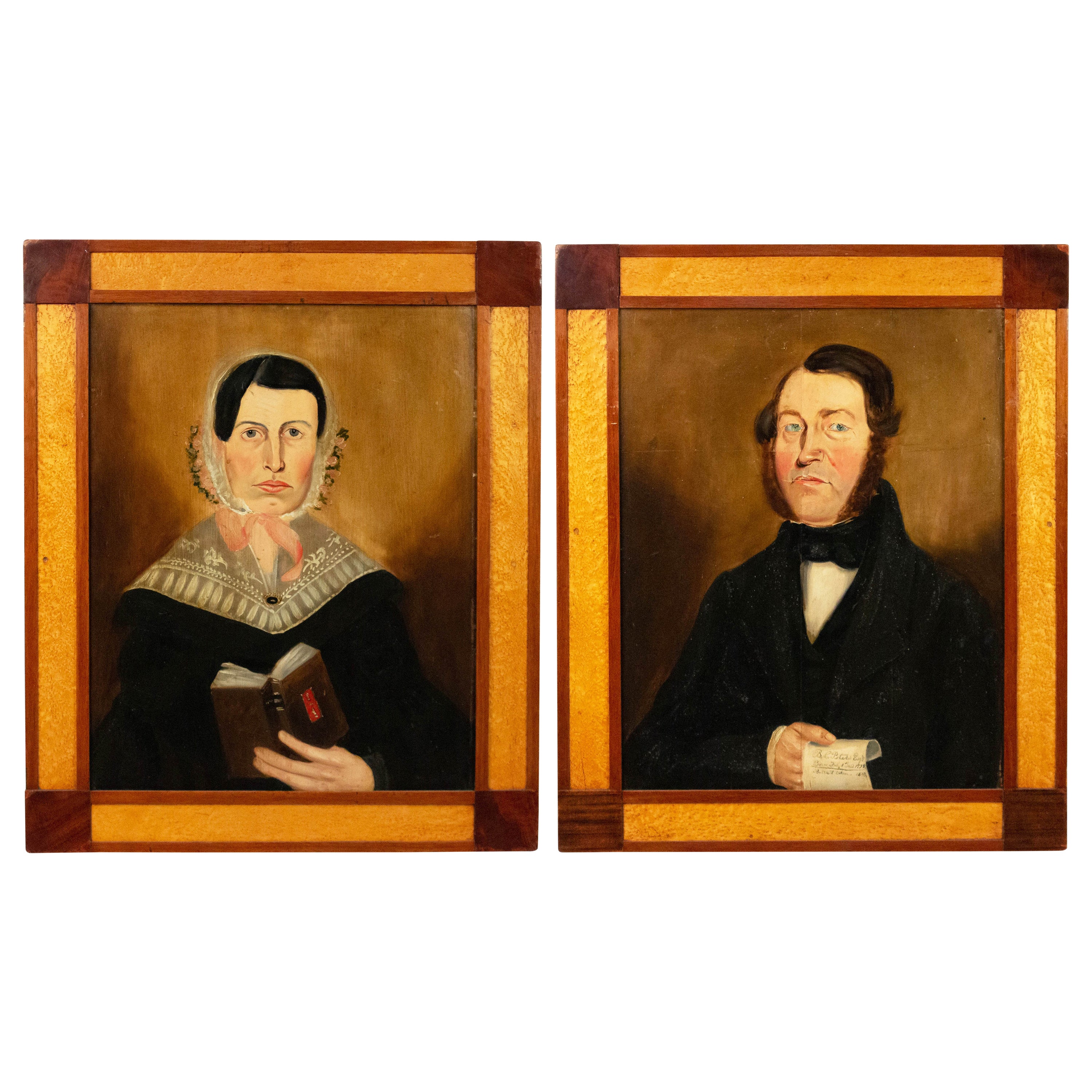 Paire de portraits d'hommes et de femmes de l'art populaire américain du XIXe siècle en vente