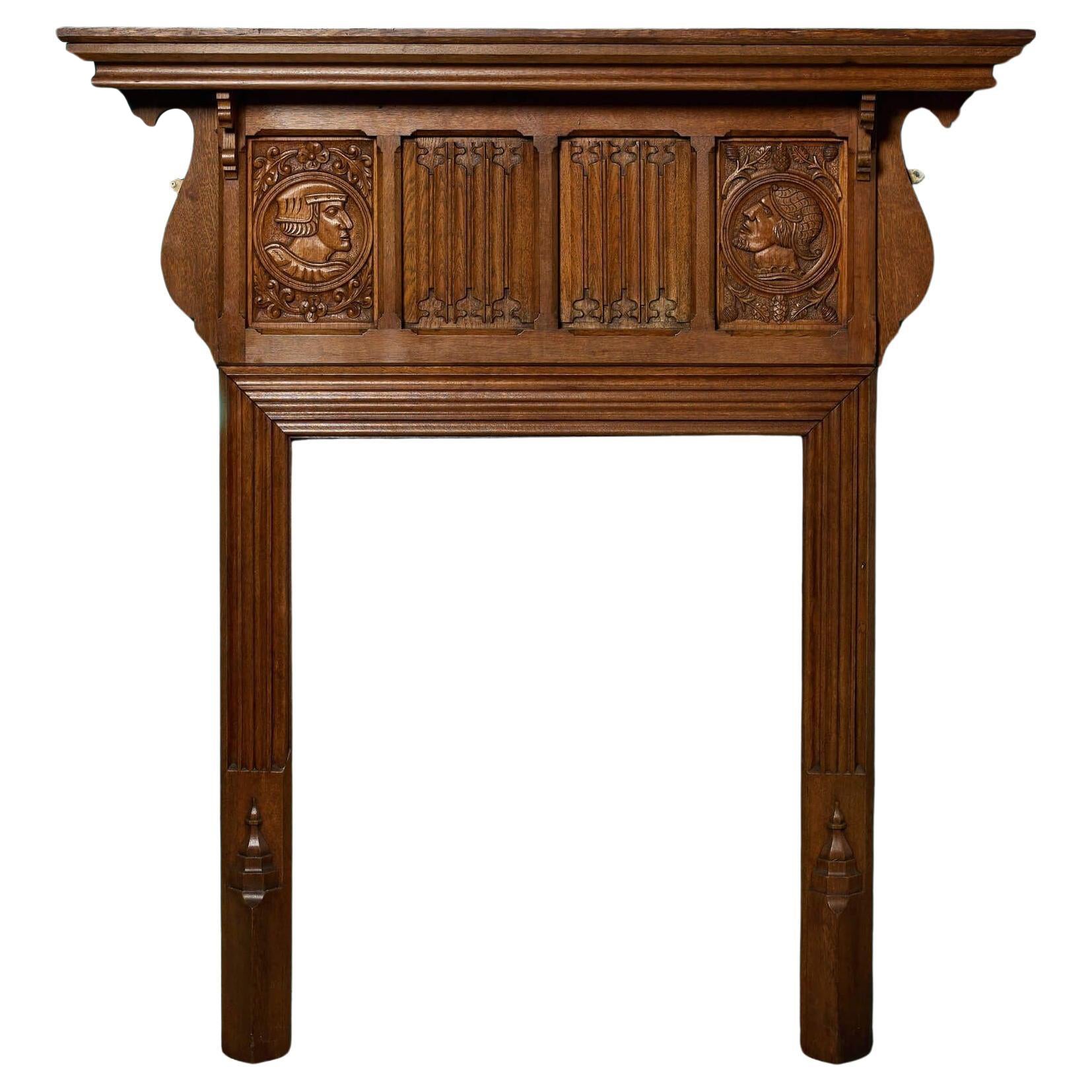 Antique Jacobean Revival Carved Oak Fireplace