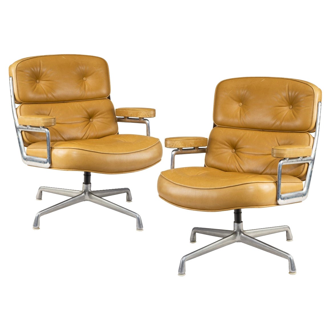 A pair of swivel “Time Life Chairs” designed by Charles & Ray Eames for Herman M